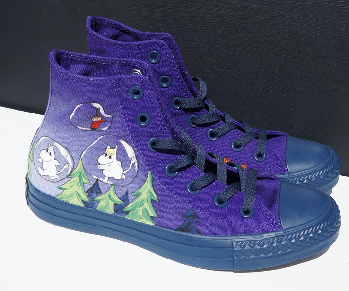 indogo hi rise converse with childrens book characters in bubbles over a forest