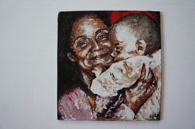Portrait of a young bother and her son, smiling