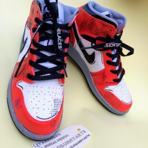 picture of some nike ai jordans painted to look like mike morales shoes